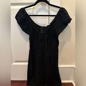 Off the shoulder, black babydoll dress